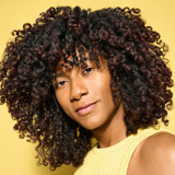 person with voluminous curly hair